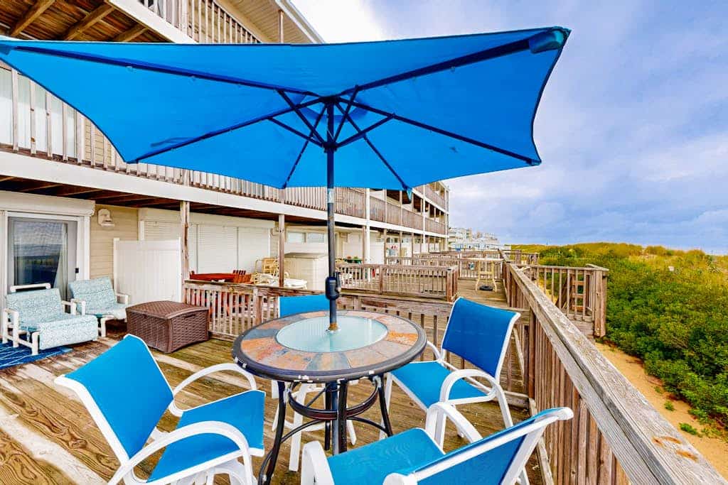 Oceanfront condo with beach access, spacious deck, full kitchen & private W/D