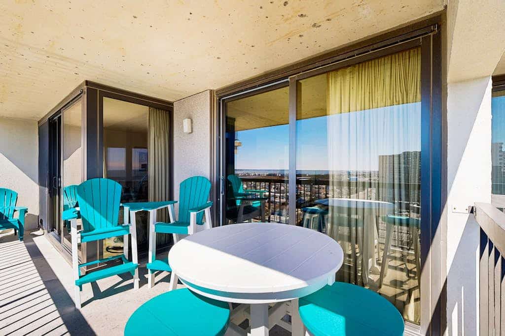 Unique beach condo near the water with balcony, pools, game room & AC