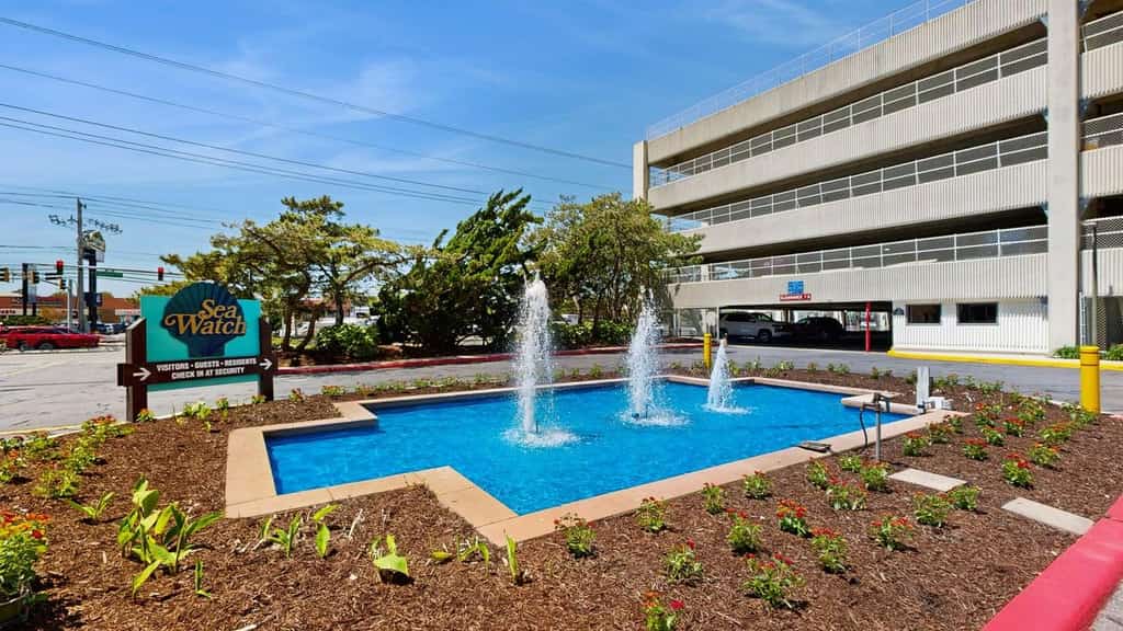 Gorgeous beachfront condo with balcony, pools, gym & game room
