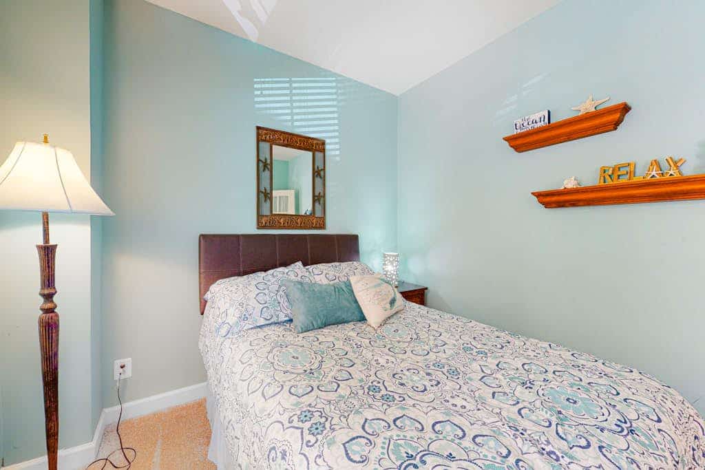 Large, welcoming house steps from bay w/water view, WiFi, AC, shared pool, & W/D
