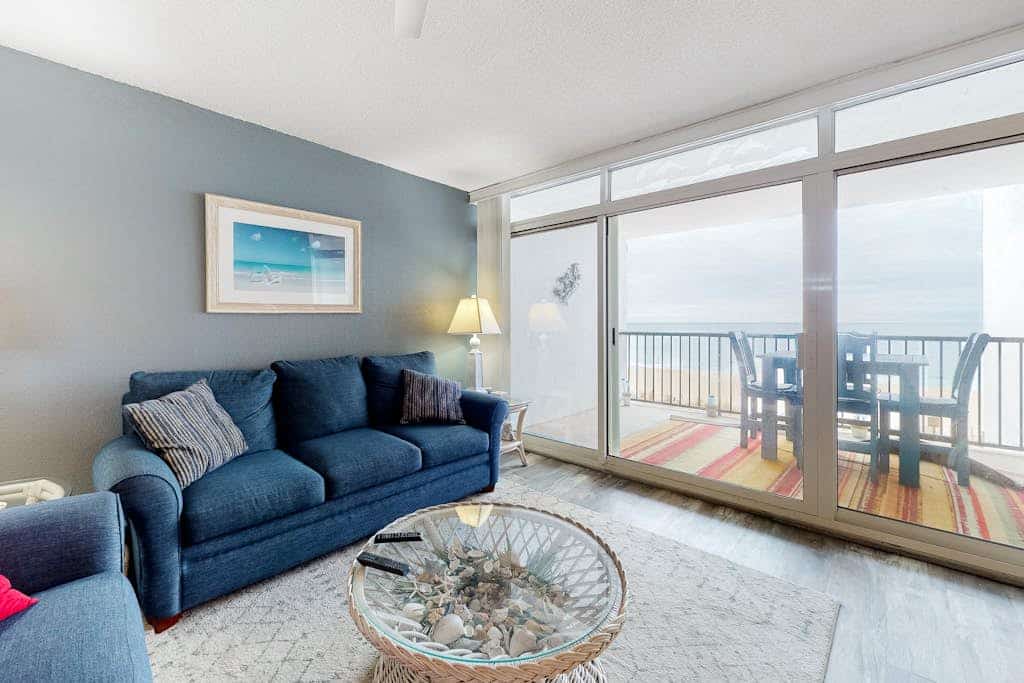 Oceanfront Condo with Balcony, WiFi, AC, Laundry, TVs & Shared Outdoor Pool