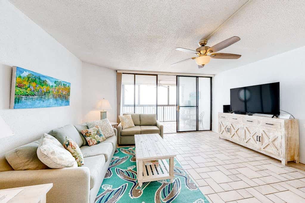 Newly updated oceanfront condo with enclosed balcony, AC, WiFi & shared pool