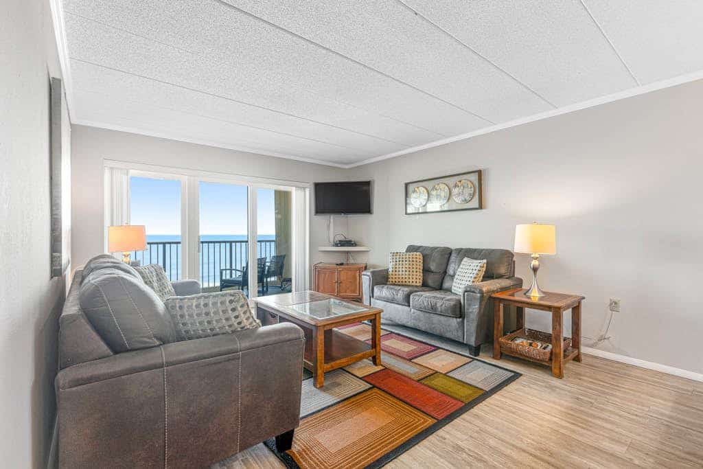 Stunning beachfront condo with pool, tennis, private balcony, AC & great views