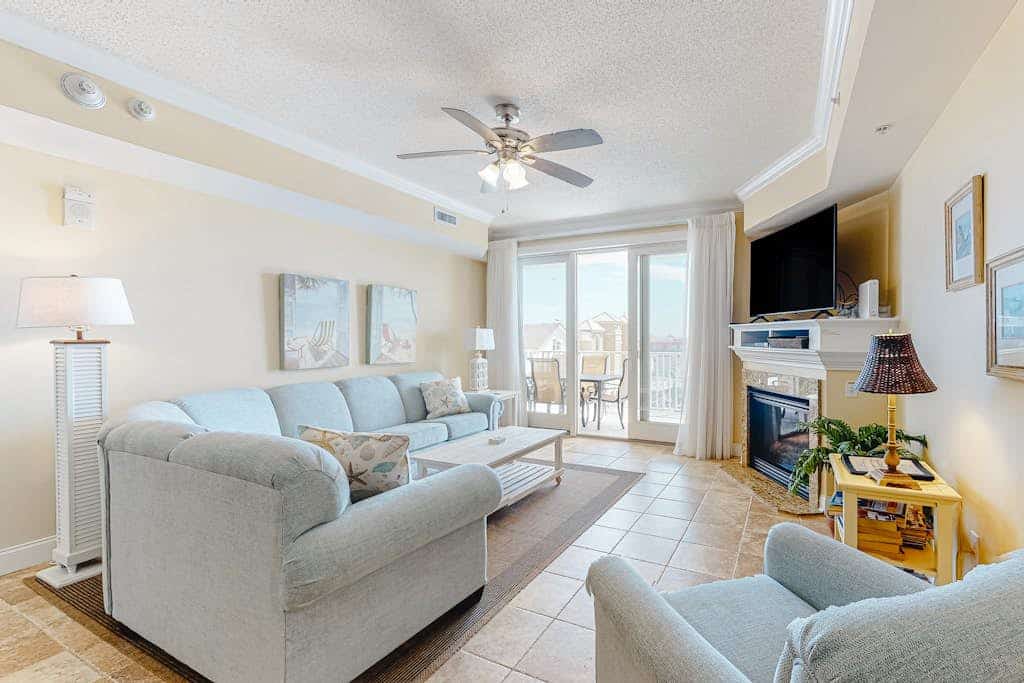 Updated condo in oceanfront building with side ocean view, pool, & gym