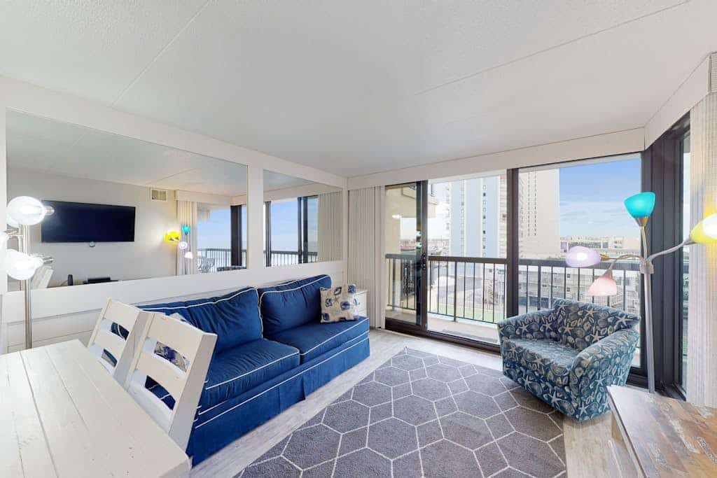 Unbeatable beach condo with balcony, W/D, pools, game room & gym