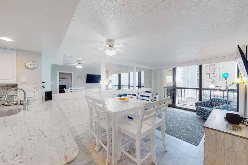 Unbeatable beach condo with balcony, W/D, pools, game room & gym