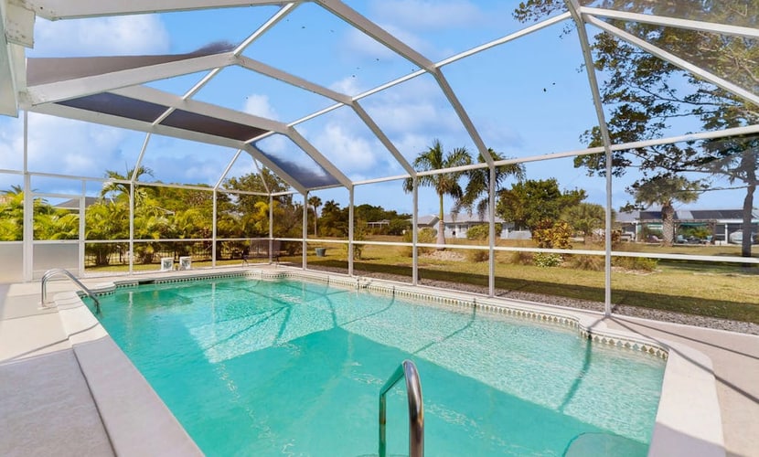 Coastal home with private, saltwater pool, gas grill, and internet