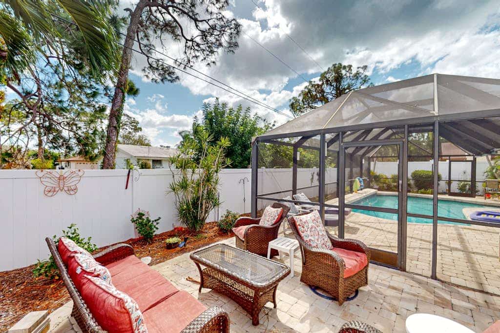 Home with private pool, enclosed yard, patio, sunroom, AC, & W/D