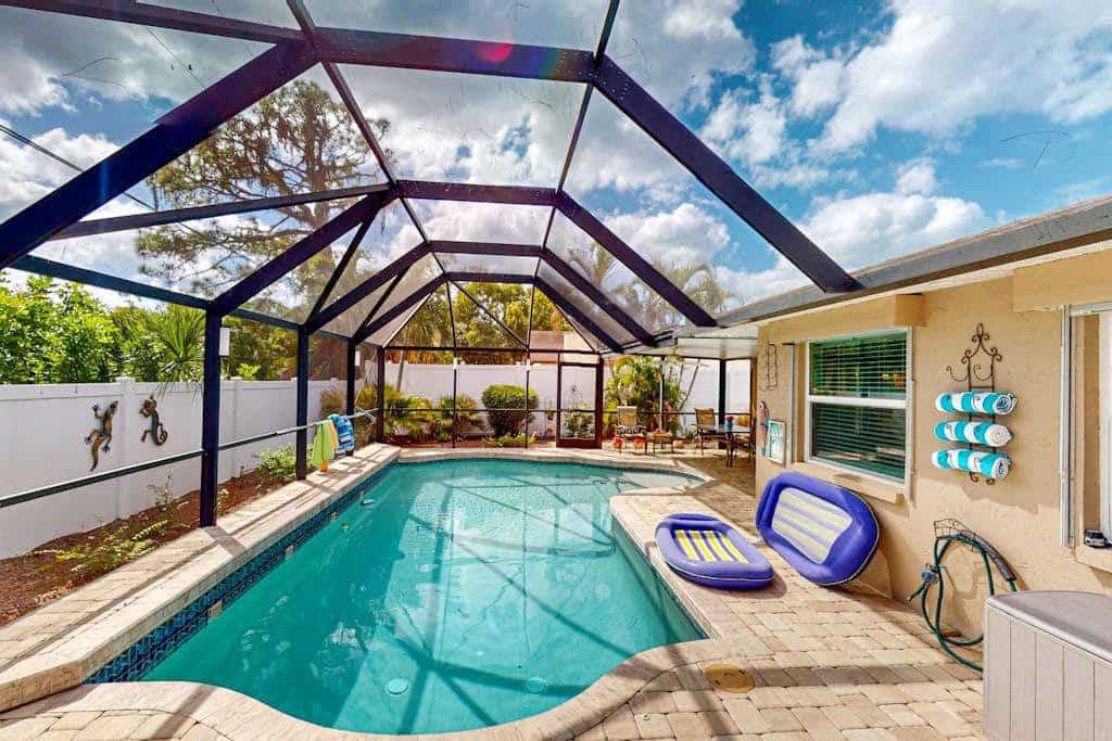 Home with private pool, enclosed yard, patio, sunroom, AC, & W/D