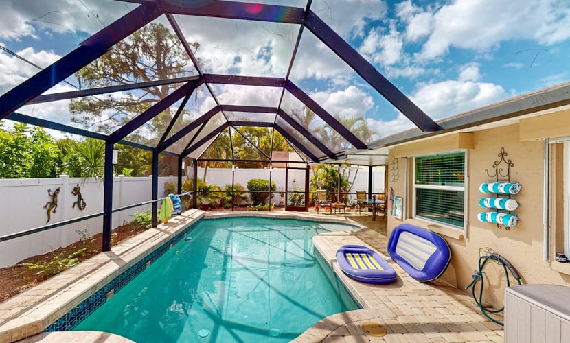 Home with private pool, enclosed yard, patio, sunroom, AC, & W/D