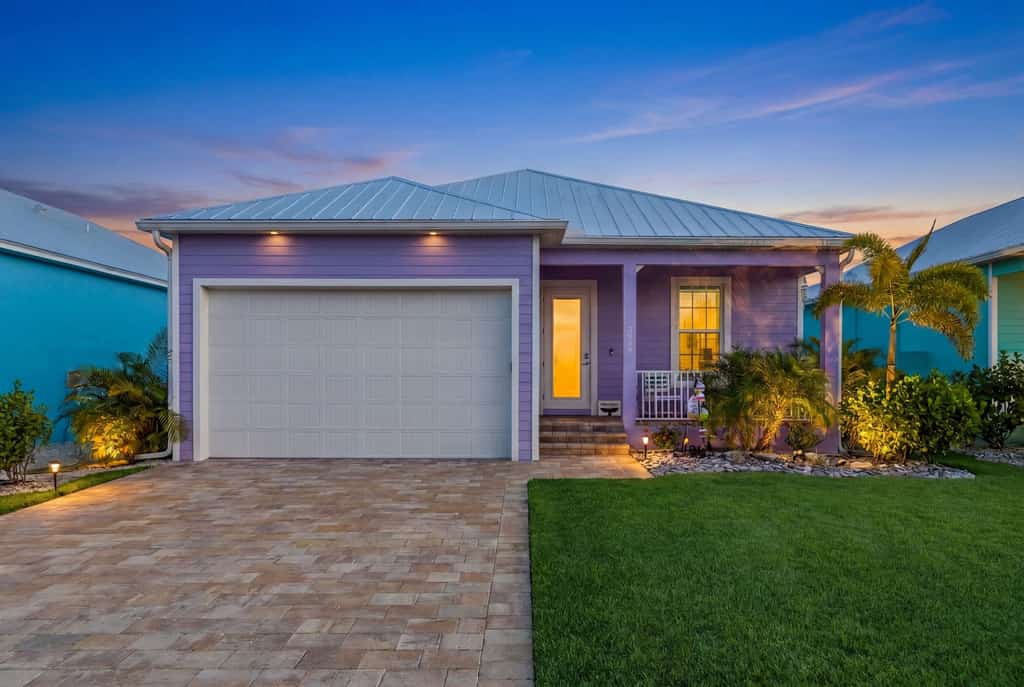 Dog-friendly, canal-front getaway with a dock, screened lanai, & washer/dryer