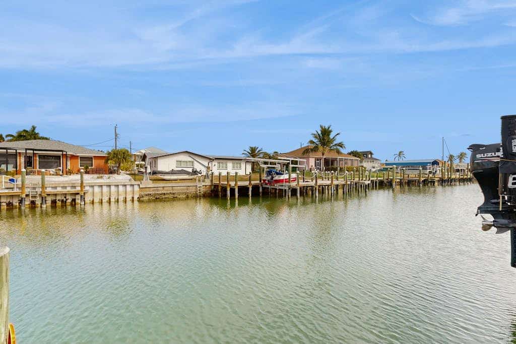 Canal front home with in ground pool, wifi, private dock & water access