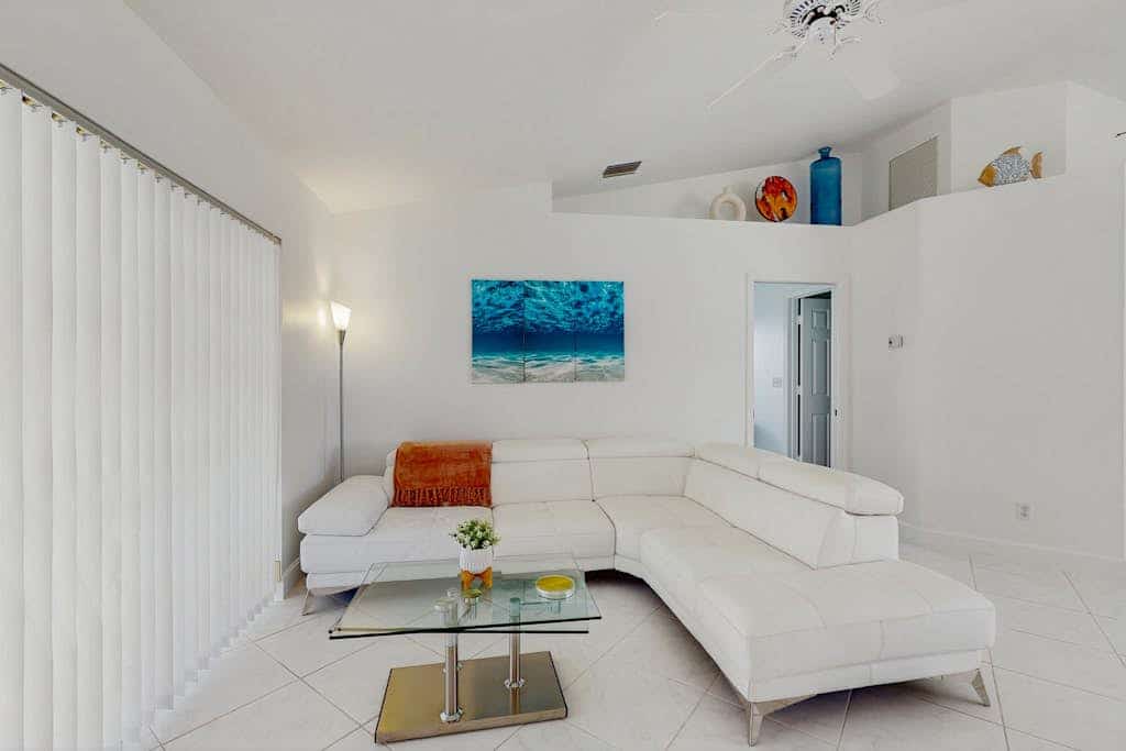 Coastal home with pool, lanai, and washer and dryer