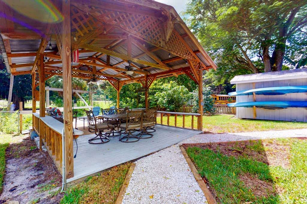 Riverfront dog-friendly cottages with kayaks, dock, patio, grill, & water views