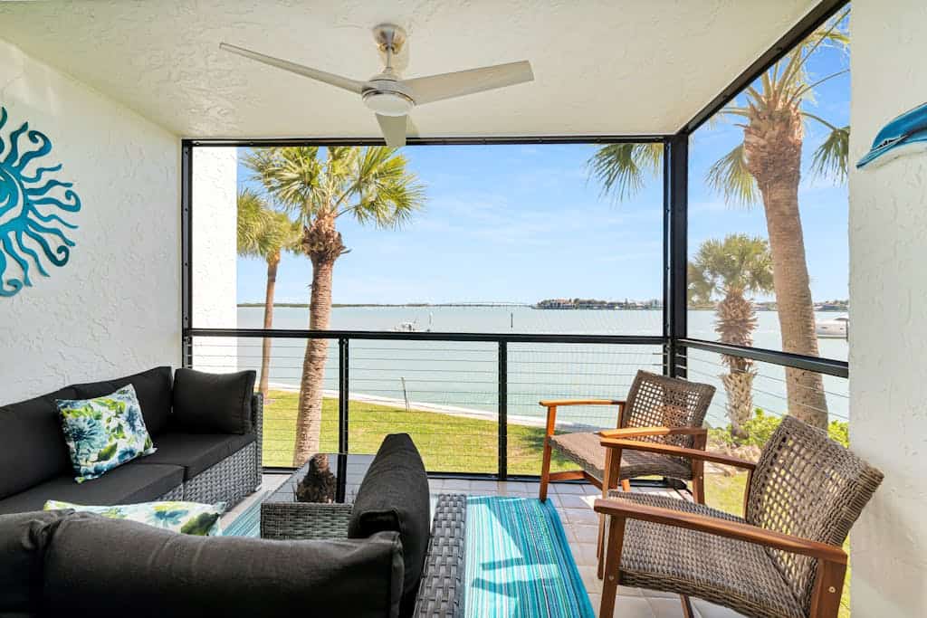 Water view condo with shared pool, panoramic balcony views, and WIFI