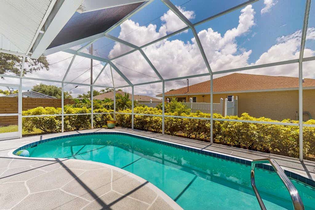 Spacious home with private saltwater heated pool, gas grill, close to the beach