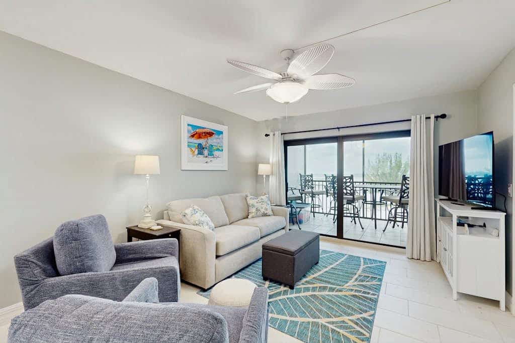 Beachfront condo with screened balcony, community pool, and internet