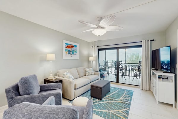 Beachfront condo with screened balcony, community pool, and internet
