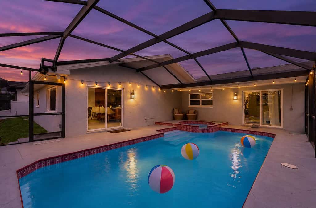 Waterfront home with private pool, game room, and washer & dryer