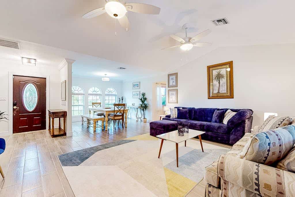 Fantastic waterfront escape with hot tub, lanai, boat lift, WiFi & central AC