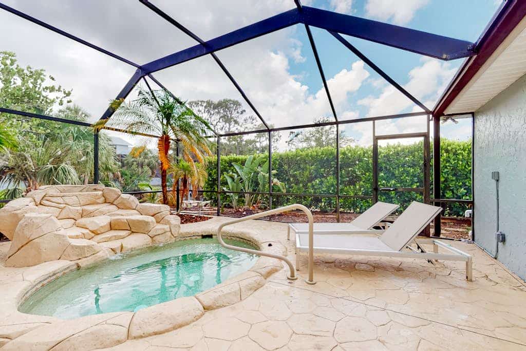 Fantastic waterfront escape with hot tub, lanai, boat lift, WiFi & central AC