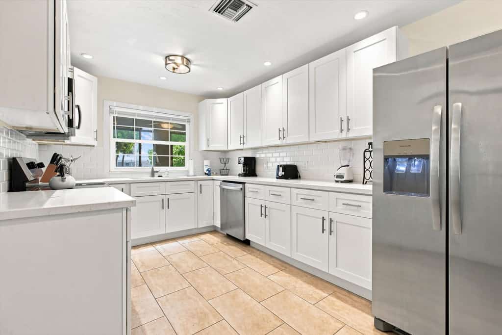 Fantastic waterfront escape with hot tub, lanai, boat lift, WiFi & central AC