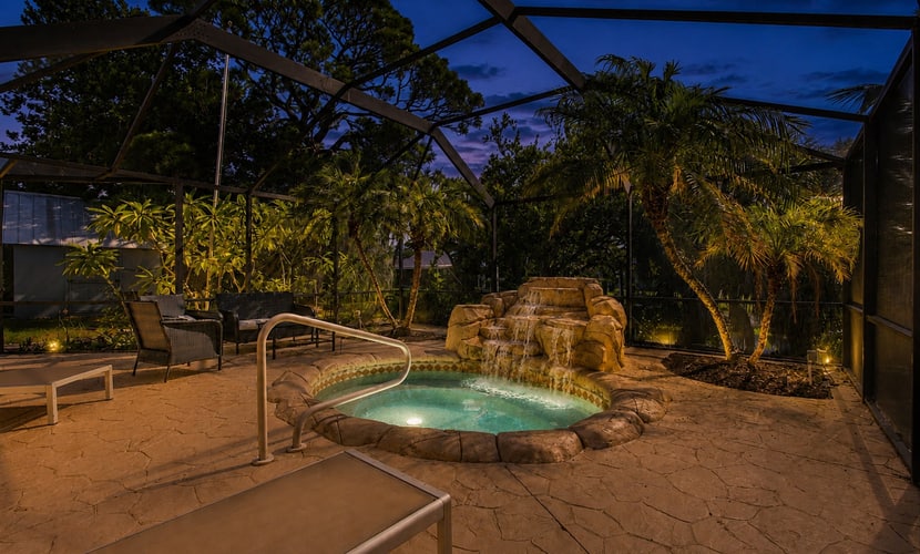 Fantastic waterfront escape with hot tub, lanai, boat lift, WiFi & central AC