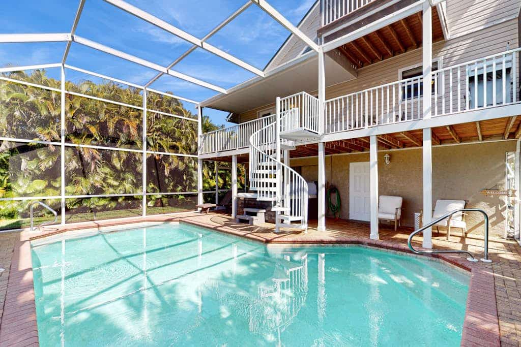 Waterfront home with private pool, kayaks, hot tub, bicycles, & W/D