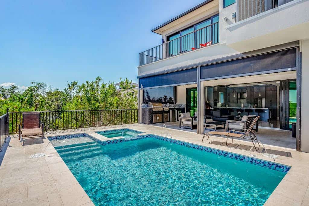 Spacious modern home close to beach with pool, central AC, & washer/dryer
