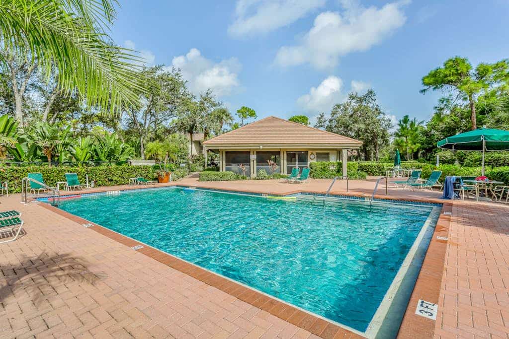 2nd-floor condo with private beach access, lanai, and access to heated pool