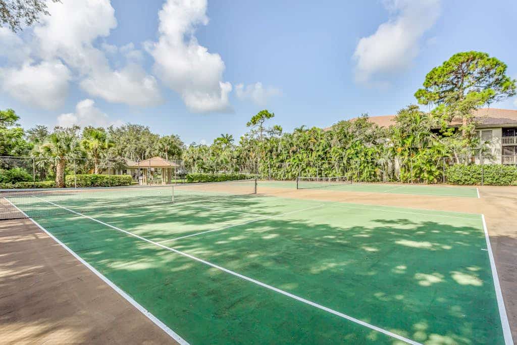 2nd-floor condo with private beach access, lanai, and access to heated pool