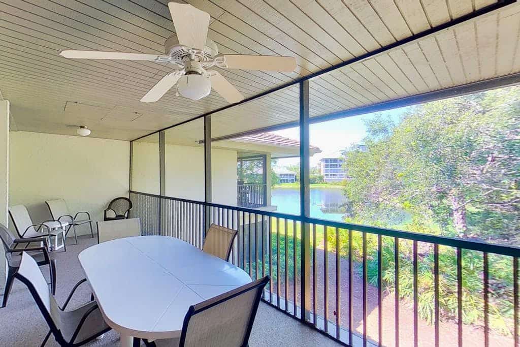 Gated resort community condo with water views, pool, hot tub, & balcony