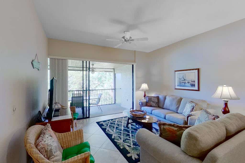 Gated resort community condo with water views, pool, hot tub, & balcony