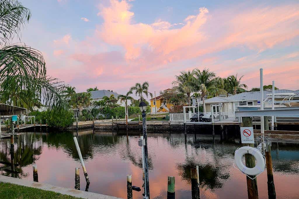 Serene & sunlit waterfront home with dock, patio, & incredible views - near golf