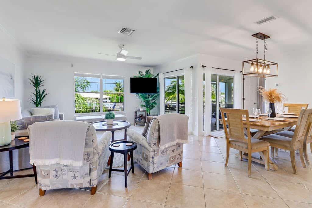 Serene & sunlit waterfront home with dock, patio, & incredible views - near golf