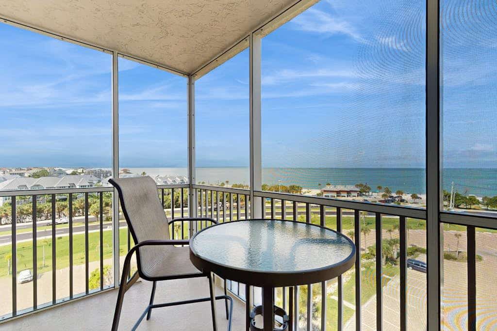 Coastal beach studio with panoramic views, pool, and direct beach access