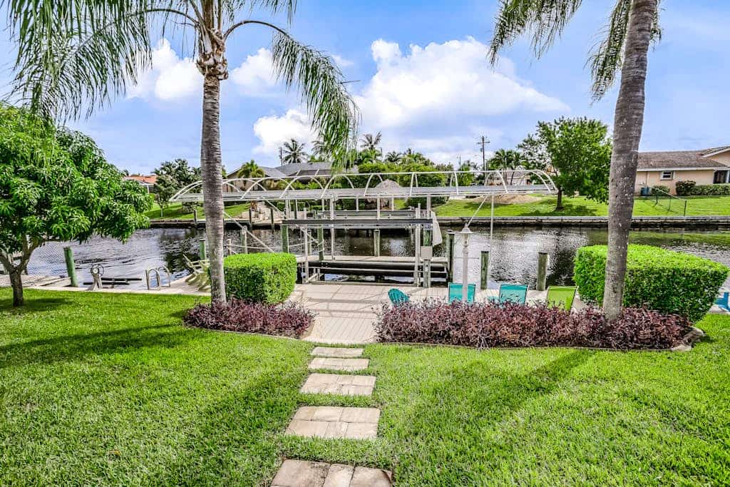Canal-front home w/ private pool, hot tub, dock & kayaks/paddleboards -1 dog OK
