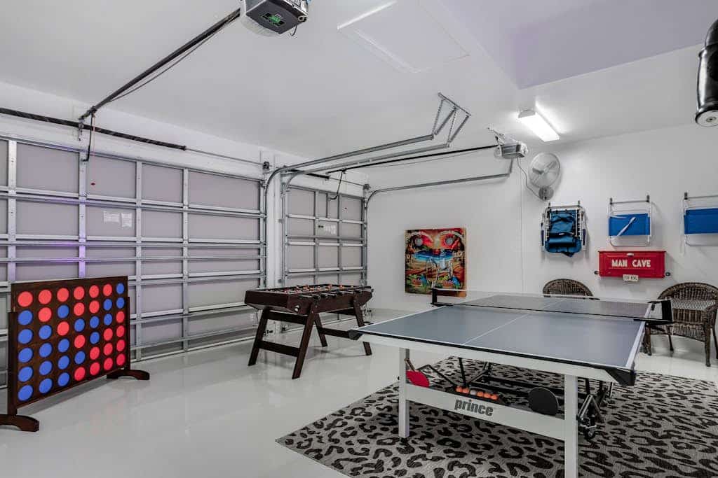 Dog-friendly home with outdoor kitchen, game room, cabana, pool spa & pool