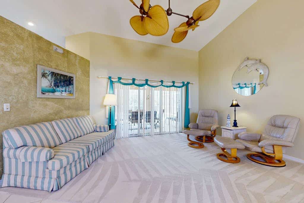 Snowbird-friendly home with lanai, private pool, & canal access