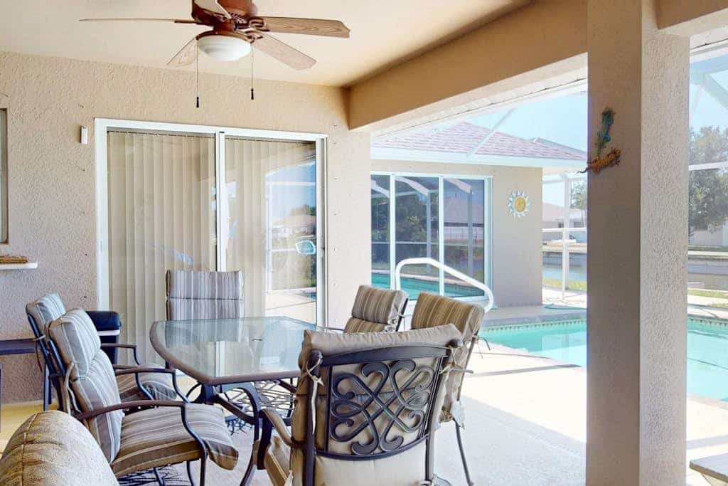 Snowbird-friendly home with lanai, private pool, & canal access