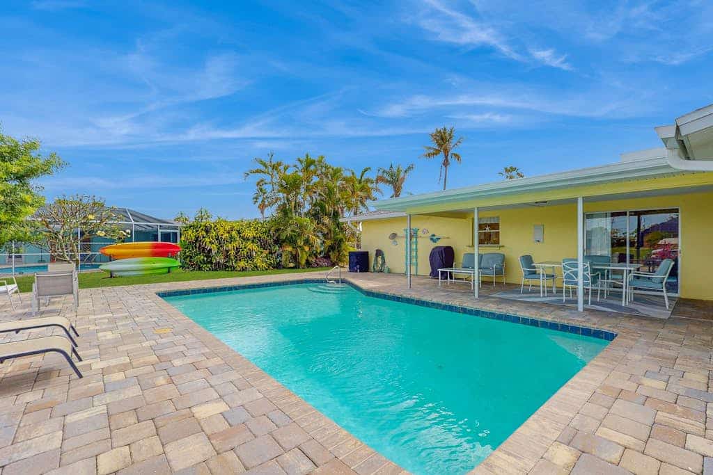 Serene Waterfront Retreat with Private Pool, Grill & Kayak Adventures