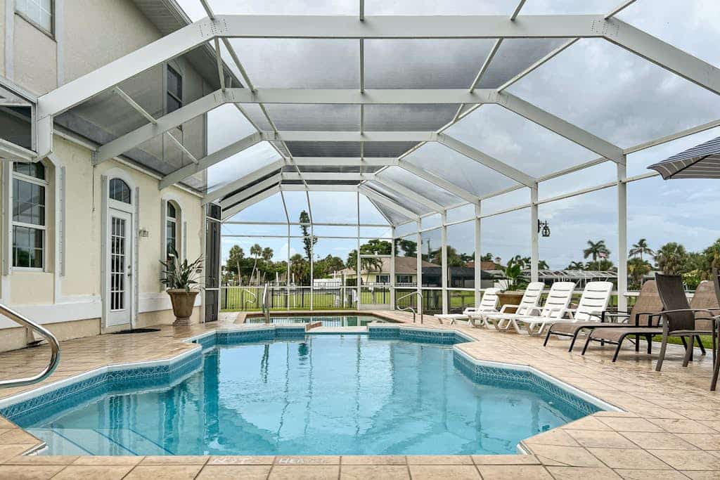Villa Euphoria: Chic 2-unit, canal-front retreat with 2 pools & private dock