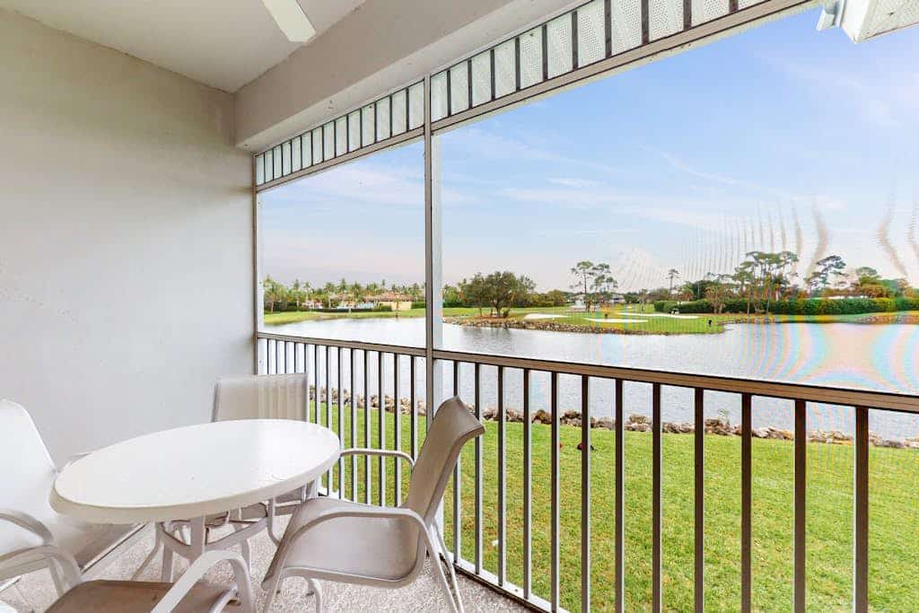 Spacious 2nd-floor condo with lake/golf view - walk to restaurant, tennis & pool