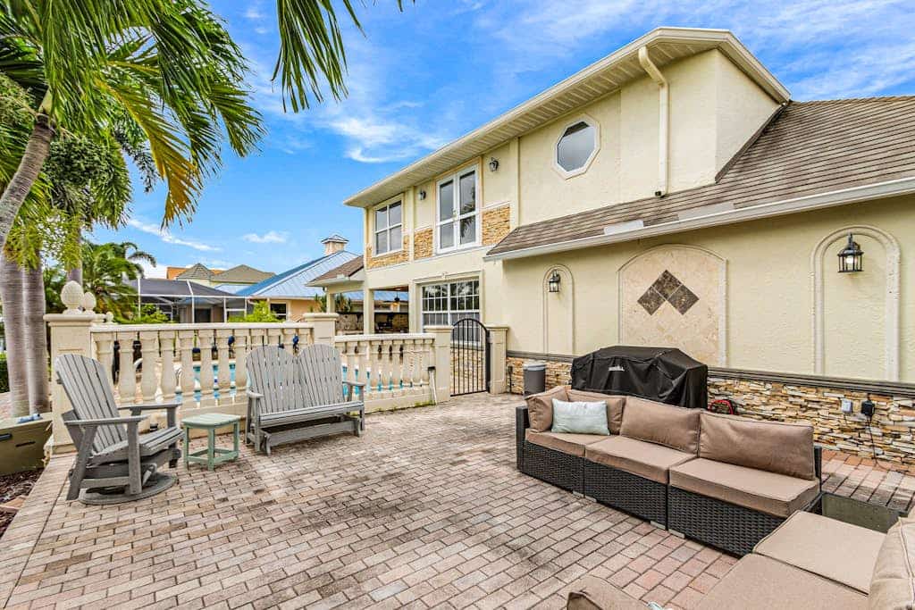 Striking European-style home w/ private pool, hot tub & river access via dock
