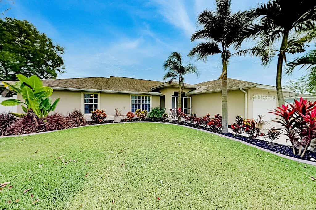 Luxury coastal retreat with office, lanai, pool, alfresco dining & tiki bar