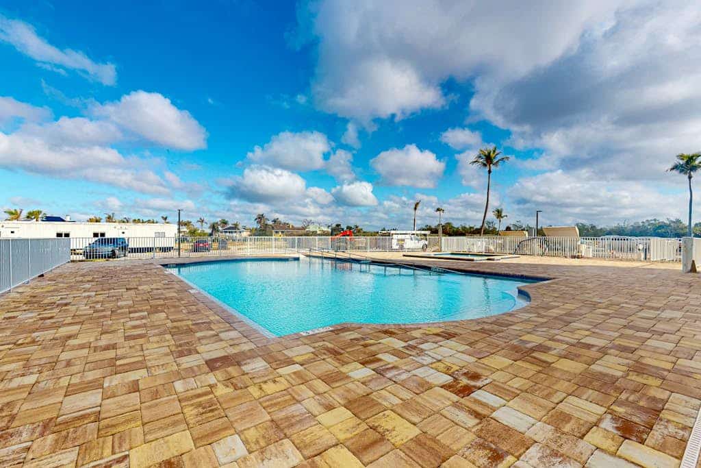 A Fully Remodeled Gulf Retreat — Stylish Comforts Steps from the Shore.