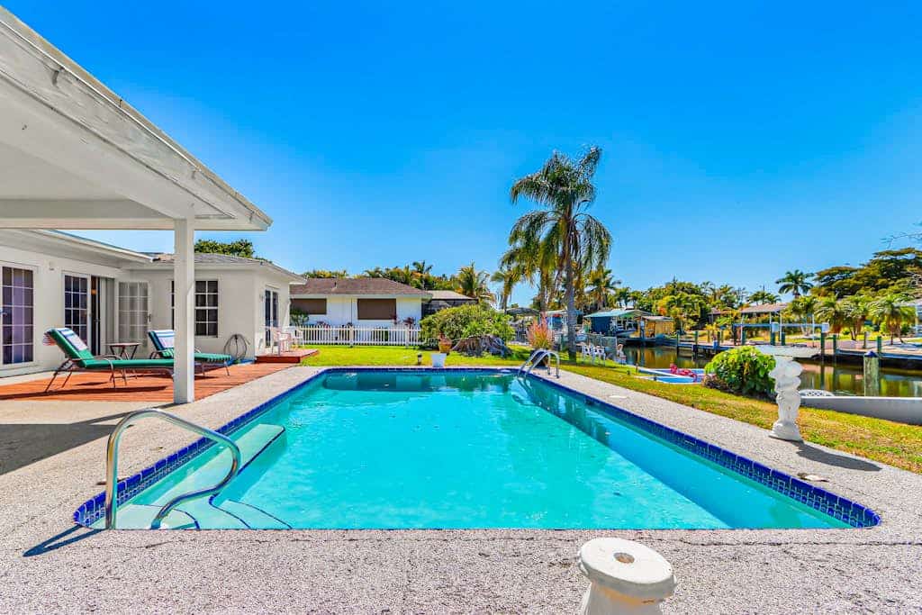 Private Canal-Front Retreat with Pool, Lanai, Patio & Waterfront Deck