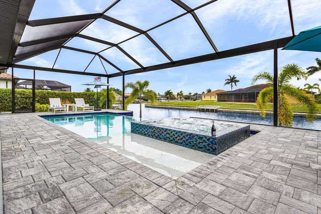 Newly-built luxury home with private infinity pool, canal views, & washer/dryer