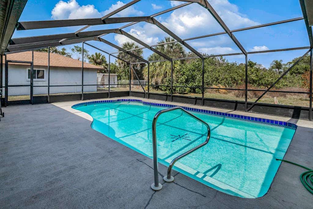 One-level home in quiet location with private pool, central AC & open layout