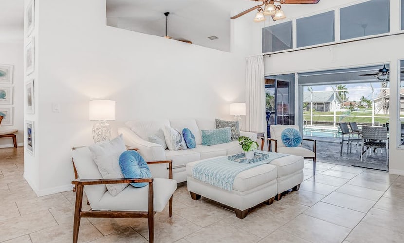 Stunning waterfront snowbird escape with private saltwater pool, dock, AC & W/D